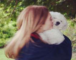 The actress has also adopted a cute dog whom she kisses to show her love.